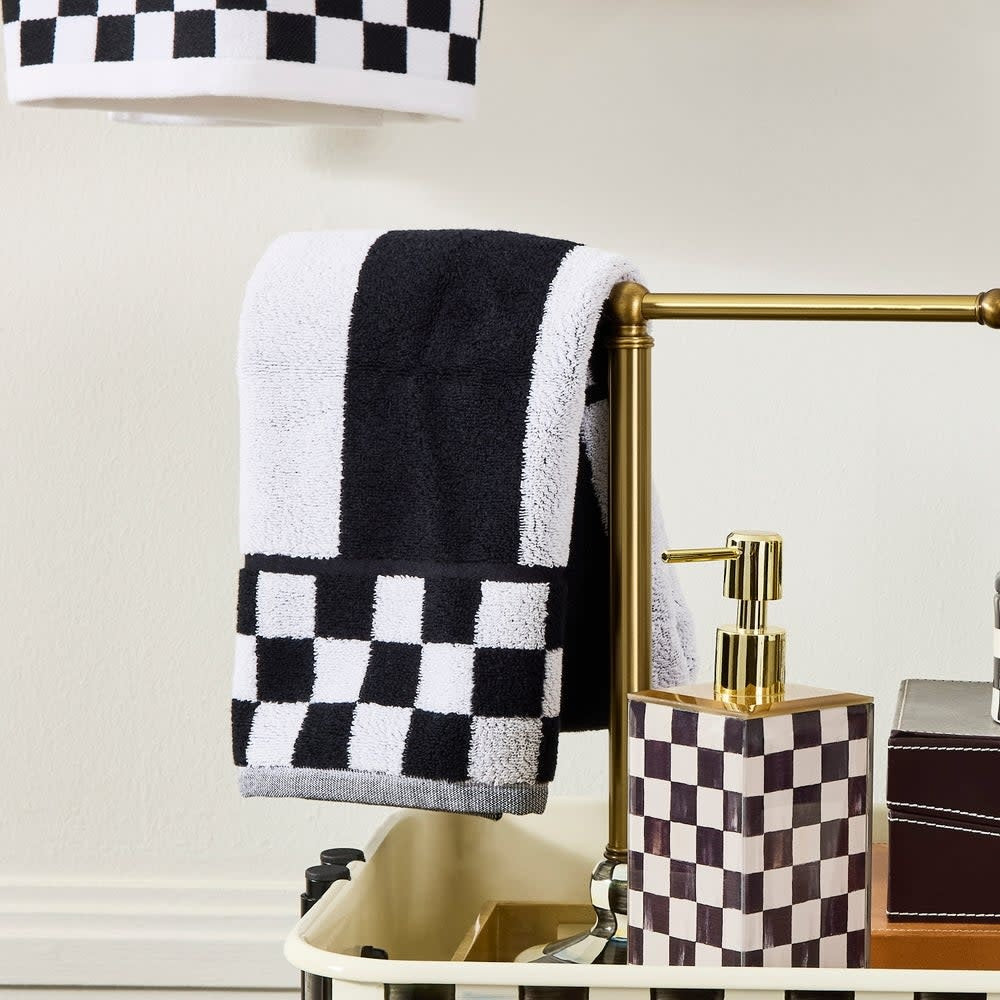 Plush cotton hand towel with contrasting horizontal stripes in blue and white.