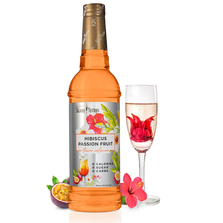 Bottle of sugar-free raspberry syrup with a white label.
