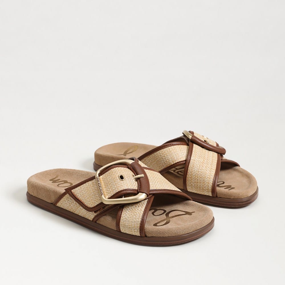 Darla Multi Buckle Slide Sandal with tan raffia straps, brown leather trim, and gold buckles.
