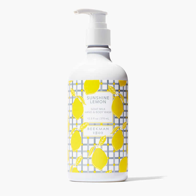 12.5oz Beekman 1802 Sunshine Lemon Goat Milk Hand & Body Wash in a white pump bottle.