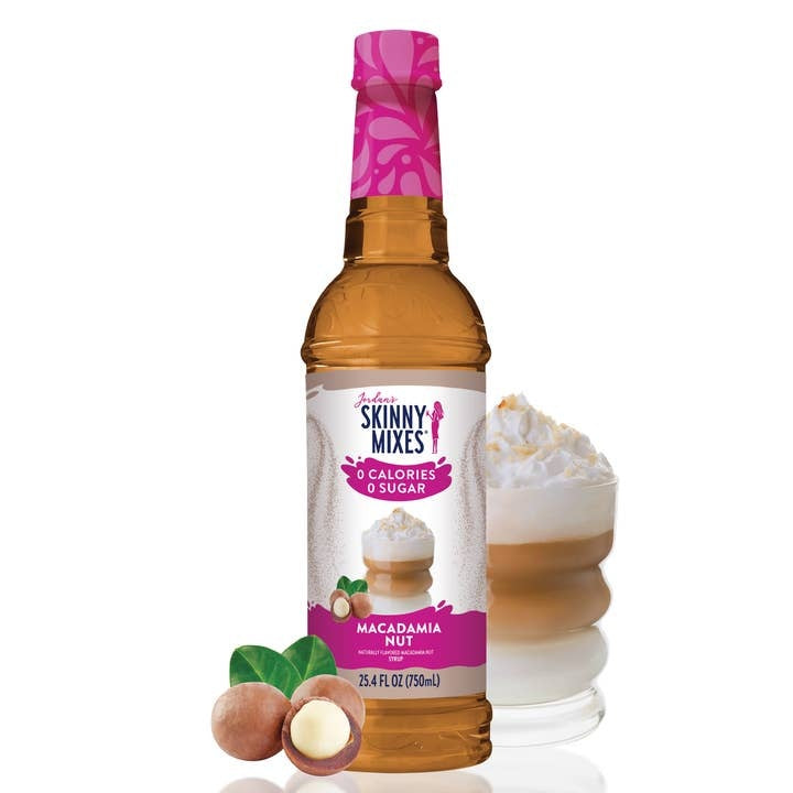 Bottle of sugar-free macadamia nut syrup with a white label against a neutral background.
