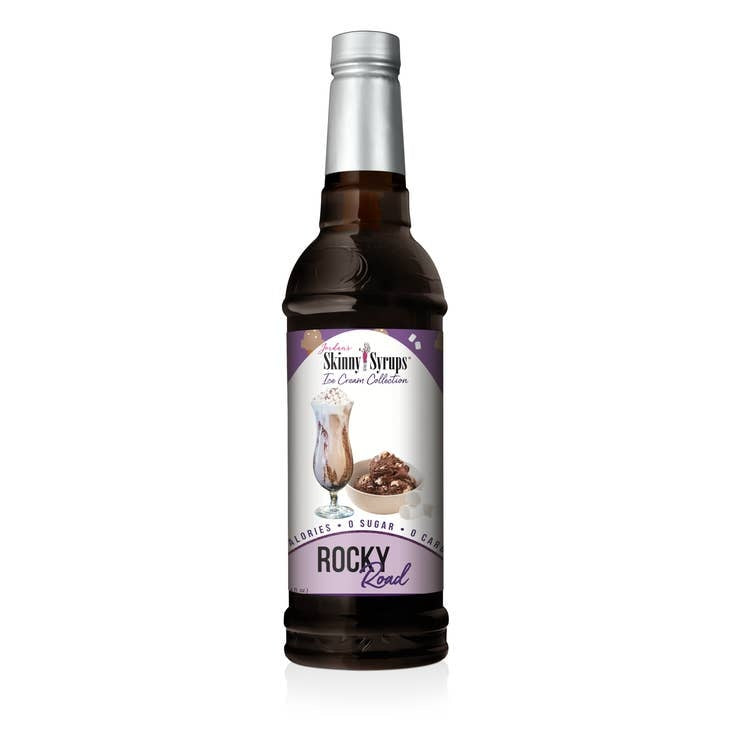 Bottle of Sugar Free Rocky Road syrup with vanilla almond flavor in a clear glass container.