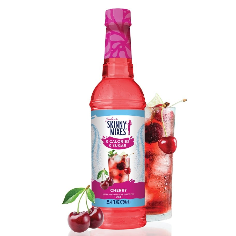 Bottle of sugar-free cherry syrup with a red liquid visible through clear glass.