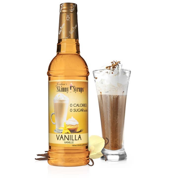 Bottle of sugar-free vanilla almond syrup with a white label.