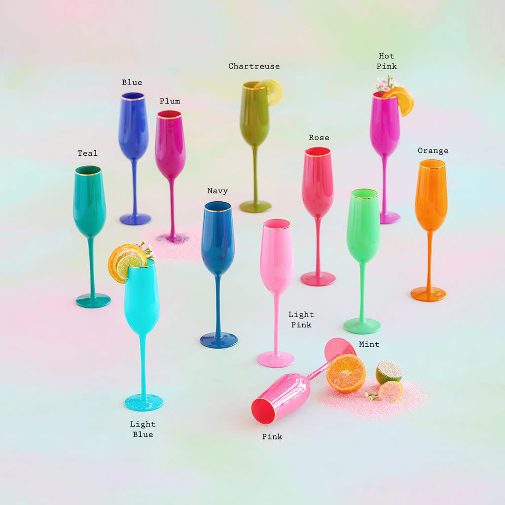 Handblown sugar plum champagne flute with gold accents