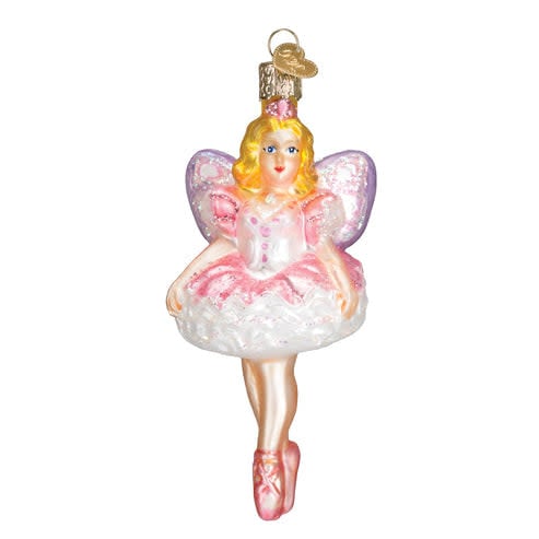 Glass Sugar Plum Fairy ornament with silver wings and pink bodice against a dark background.