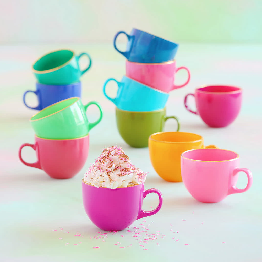 Handblown glass Sugar Plum mug with vibrant colors, real gold accents, and a whimsical sugar plum design.