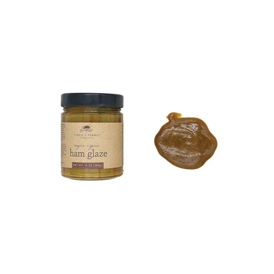 Jar of Sugar + Spice Ham Glaze with brown sugar glaze on lid