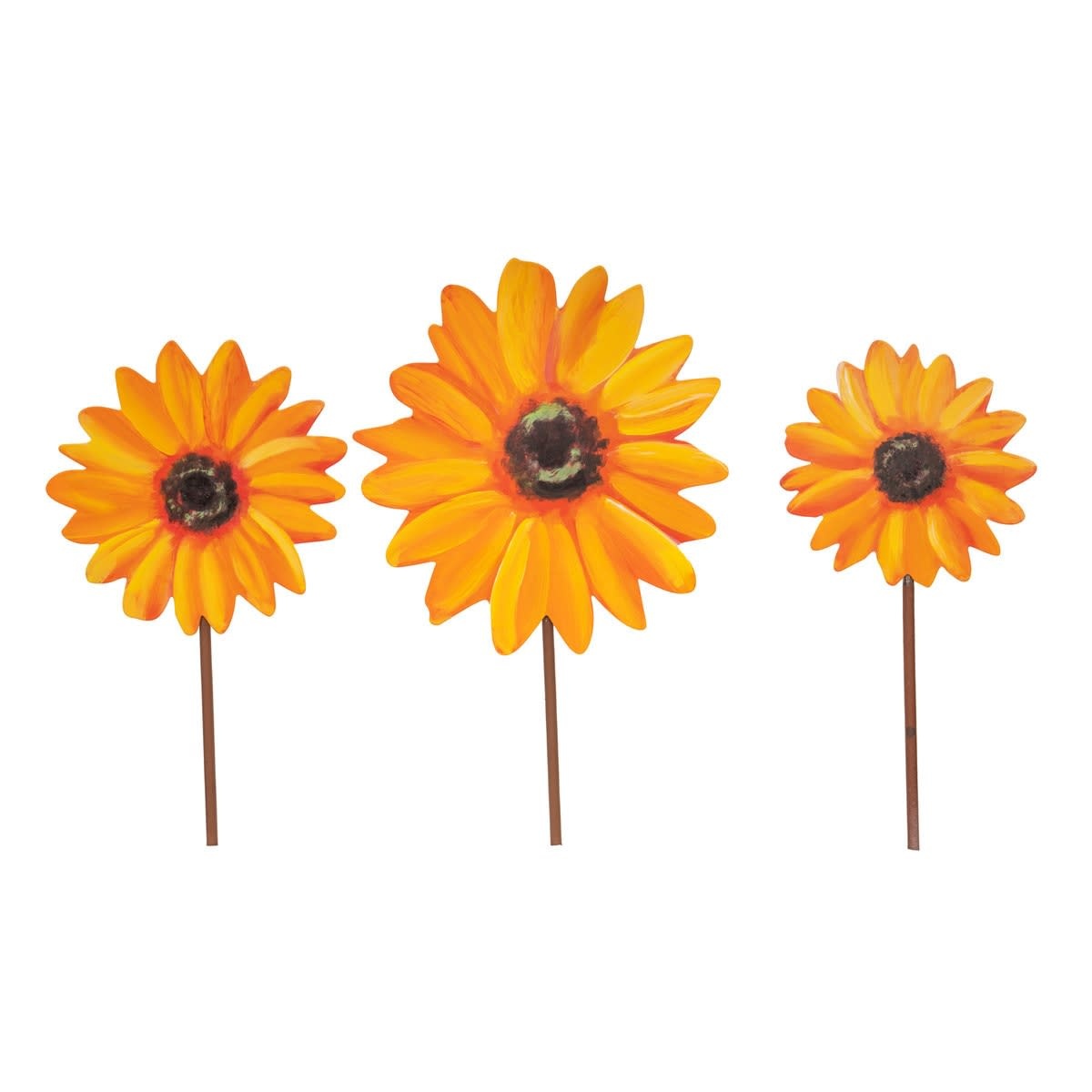 Metal sunflower stake with yellow petals in a natural setting.