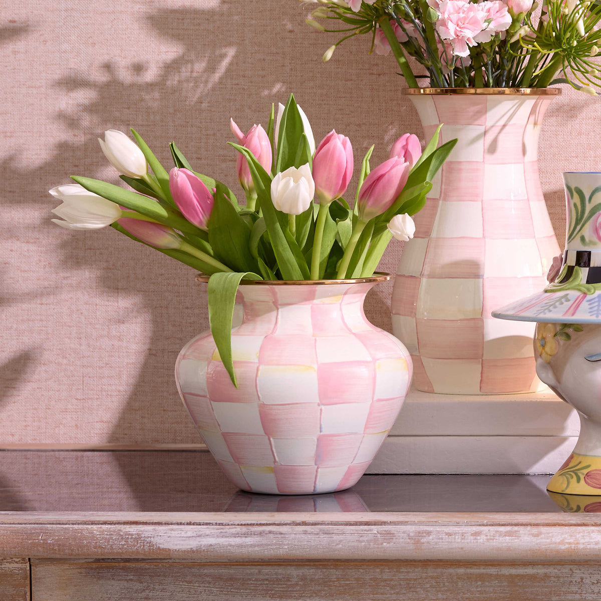 Rosy Check Large Vase with pink and white hand-painted checks, filled with pink and white tulips.