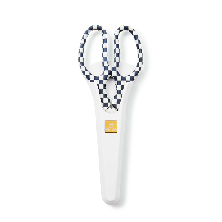 Black and white checkered stainless steel kitchen shears with an ergonomic handle.