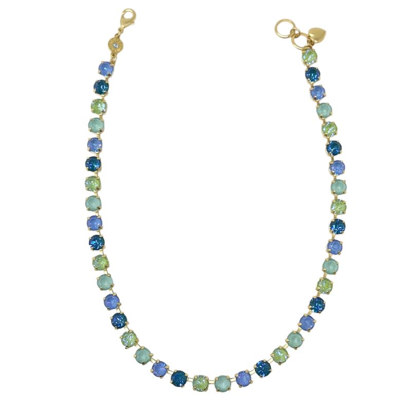 Gold Classic Necklace - Laguna Beach featuring blue and green round crystals in a gold-tone setting.
