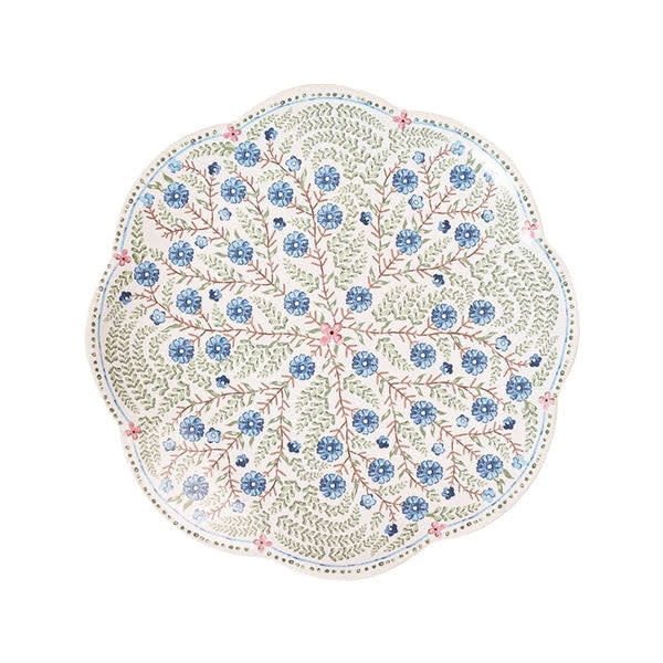 Ceramic scalloped dessert plate in chambray blue with pink floral pattern and leaf motifs