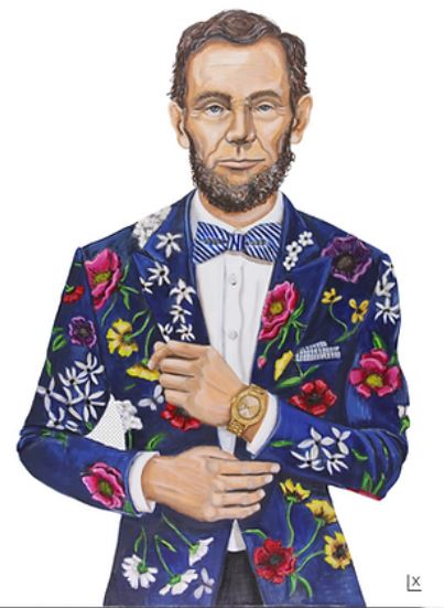 Abraham Lincoln in a blue floral suit and striped bow tie, adjusting his watch.