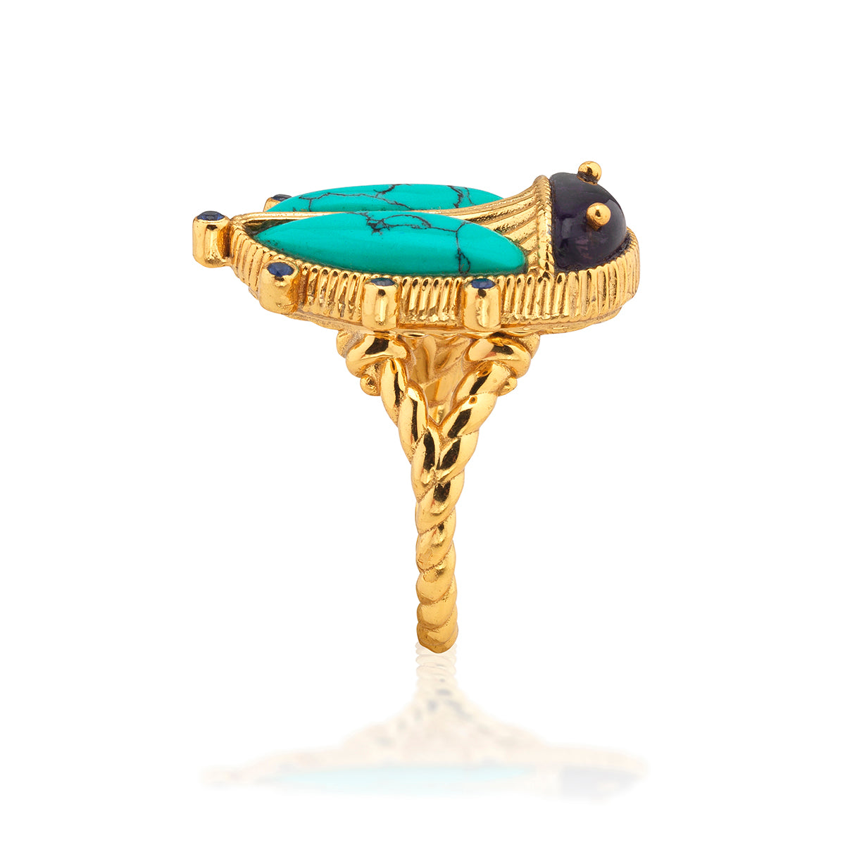 Scarab Grande ring in gold-plated brass with a detailed scarab beetle silhouette and textured band.