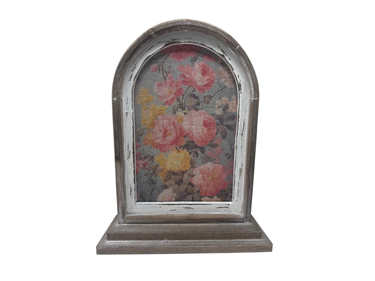 Rustic wood arch decoration featuring a floral rose print on a mesh background.