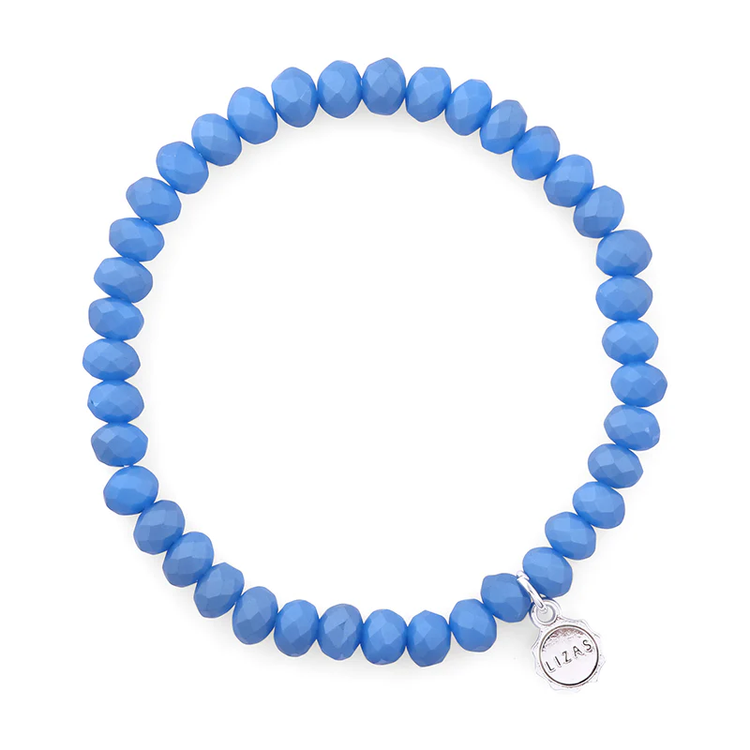 Lizas Quadro Big Bright Colours stretch bracelet with faceted blue crystal beads and silver charm.