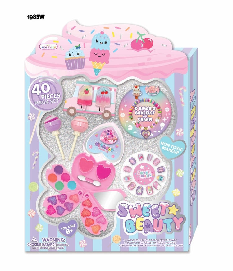 Sweet Beauty Sweets set with colorful lip glosses, eyeshadows, hair clips, rings, bracelets, press-on nails, and a cosmetic palette.