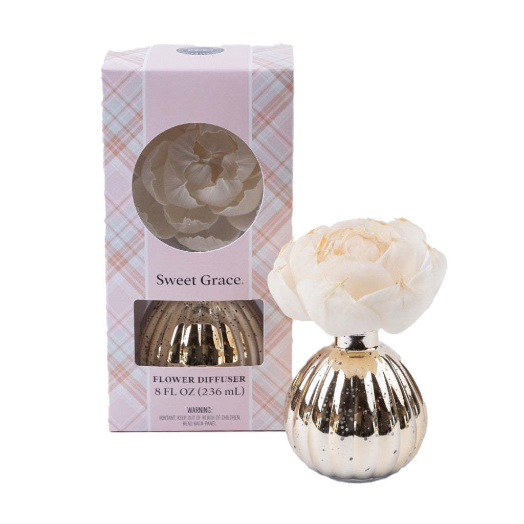 Sweet Grace Holiday Flower Diffuser with gold mercury finish vase holding a dried flower stem.