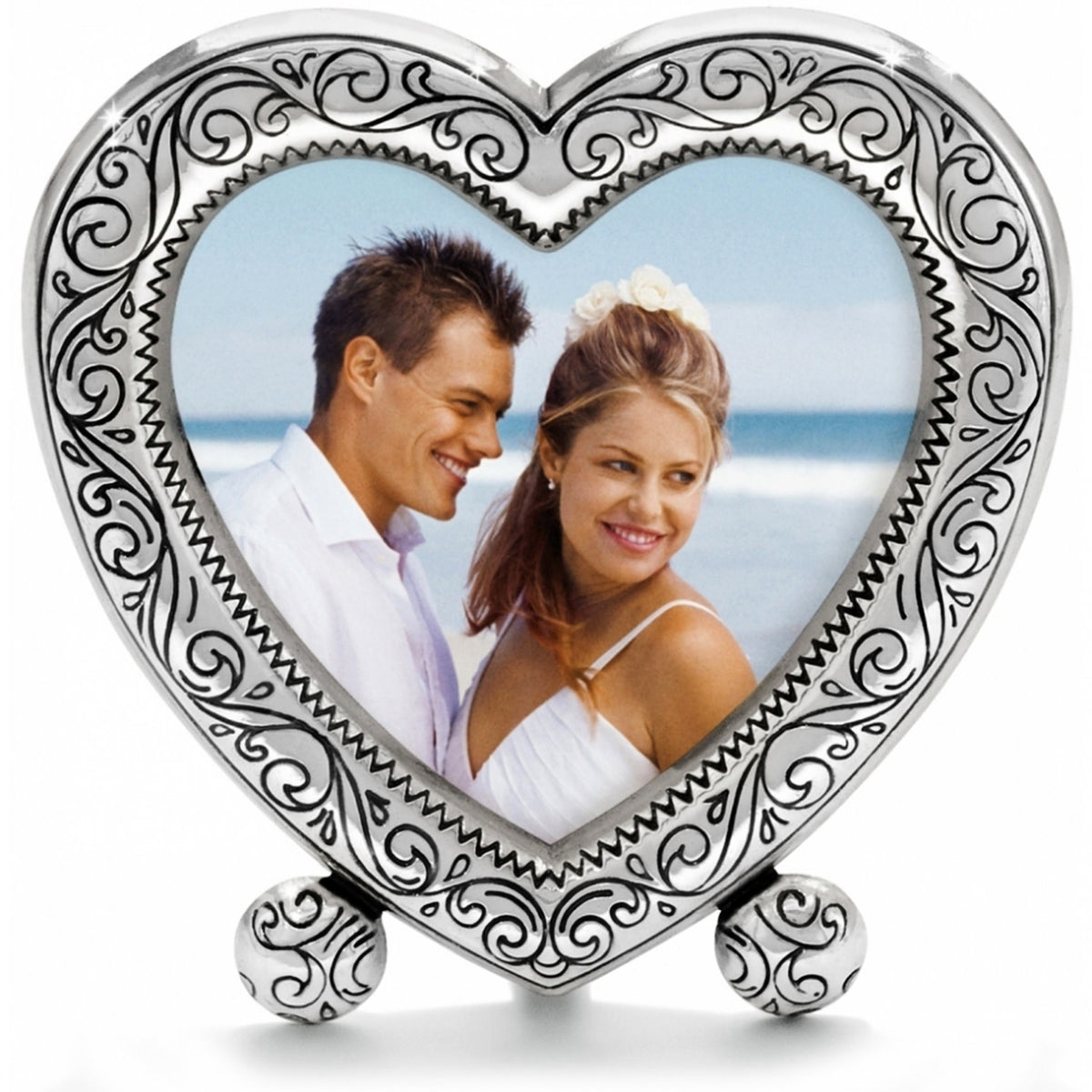Silver plated sweetheart frame holding a photo