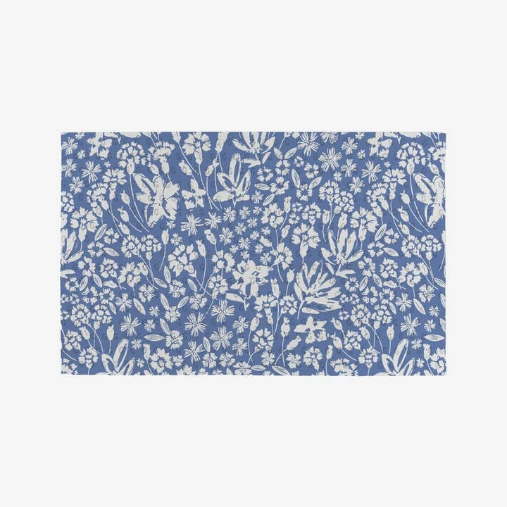 Floral-patterned reusable kitchen towel made from recycled materials.
