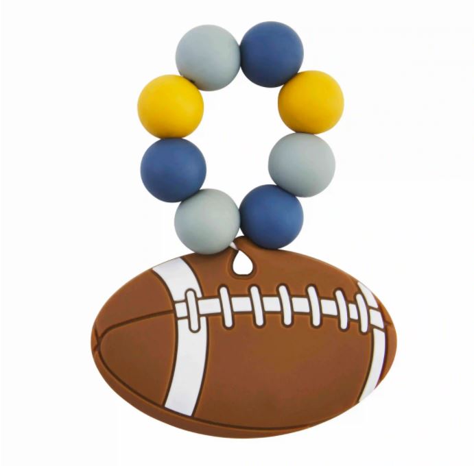Colorful football-shaped silicone teether with a bauble ring handle.