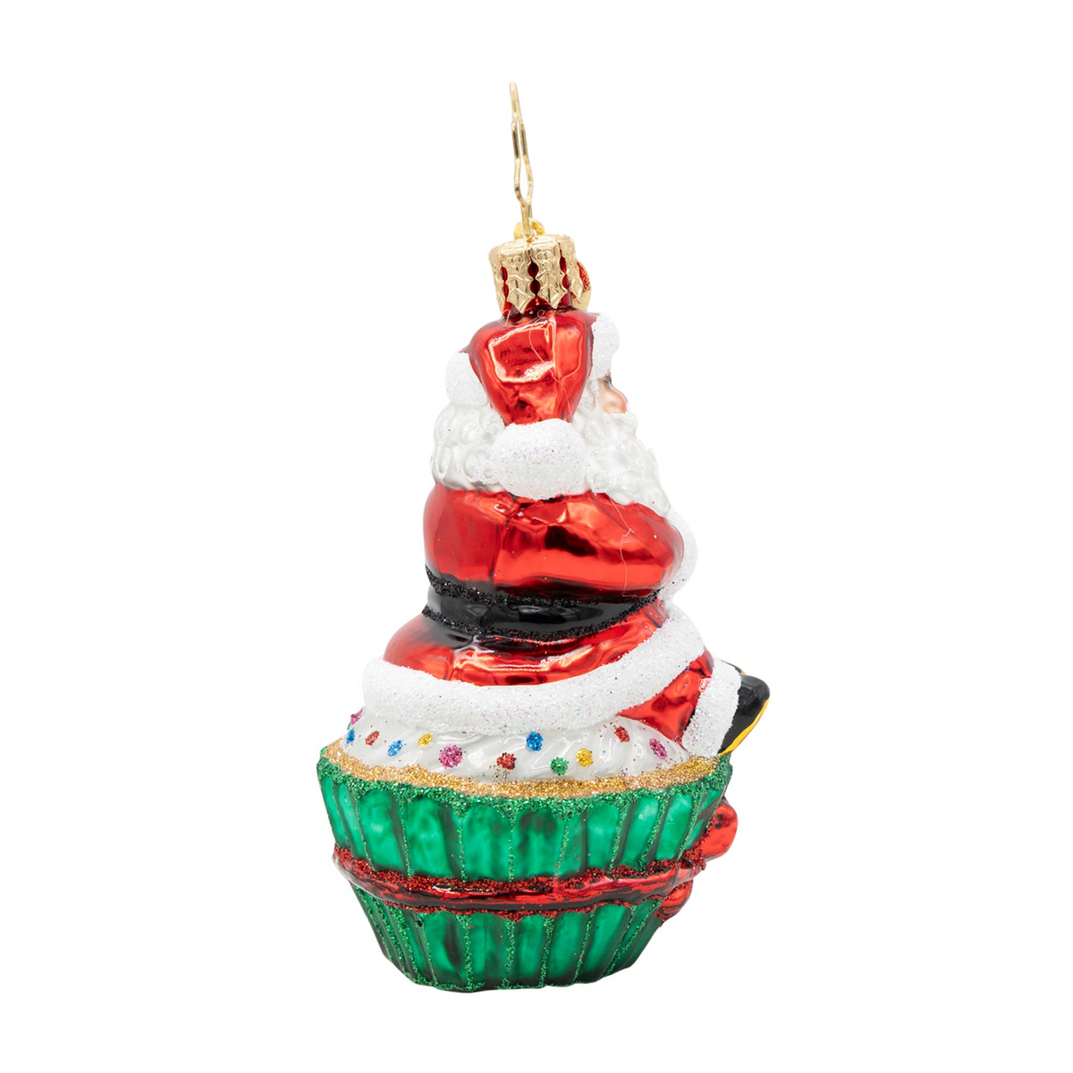 Glass Christmas ornament featuring Santa Claus sitting on a green and white glittery cupcake.