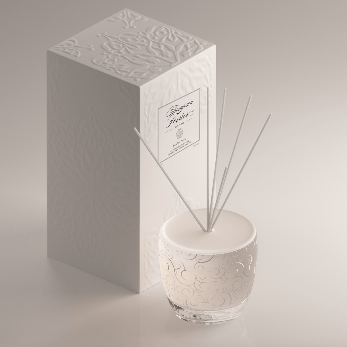 Santal Cave reed diffuser bottle with natural wood sticks in a neutral-toned glass container.