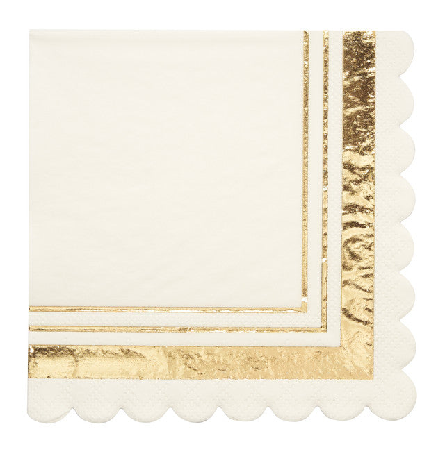 Packaged Caspari triple-ply cocktail napkins featuring museum artwork printed in Germany.