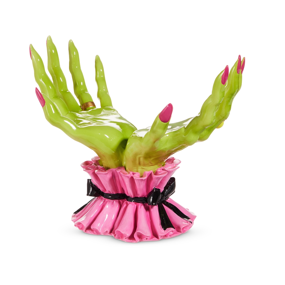 10-inch decorative green witch hands with pink nails emerging from a ruffled pink base with a bow.