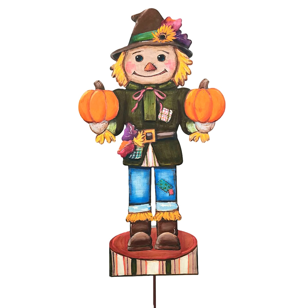 Hand-painted scarecrow nutcracker garden stake holding two pumpkins and wearing a brown hat.