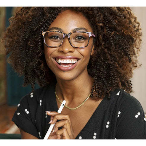 Pink Sycamore eyeglasses with botanical print temples featuring spring hinges.