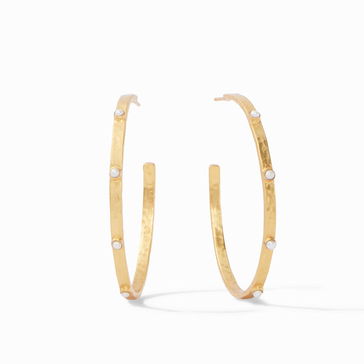Lightly hammered gold hoop earring with gemstone accents