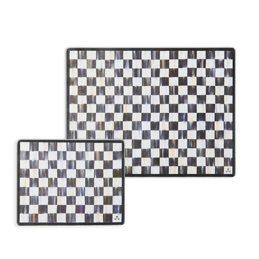 Set of two Courtly Check tempered glass cutting boards with a blue checkered pattern.