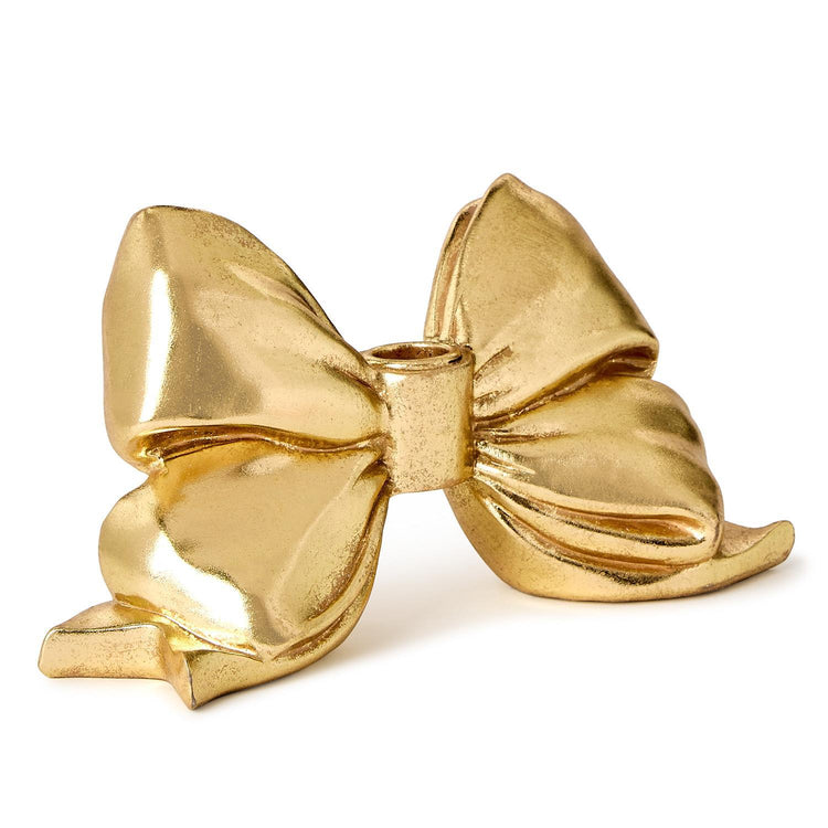 Large gold resin taper candleholder with a bow-shaped silhouette
