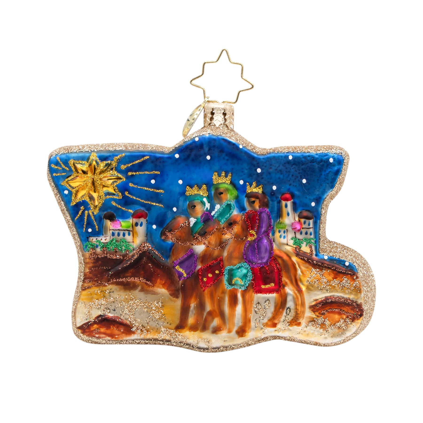 Glass ornament shaped like Louisiana featuring the Three Wise Men on camels under a shining star.