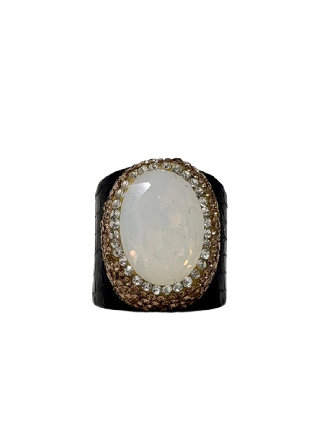 Queen of Sheba Fashion Ring featuring a large oval white stone surrounded by crystals on a black band