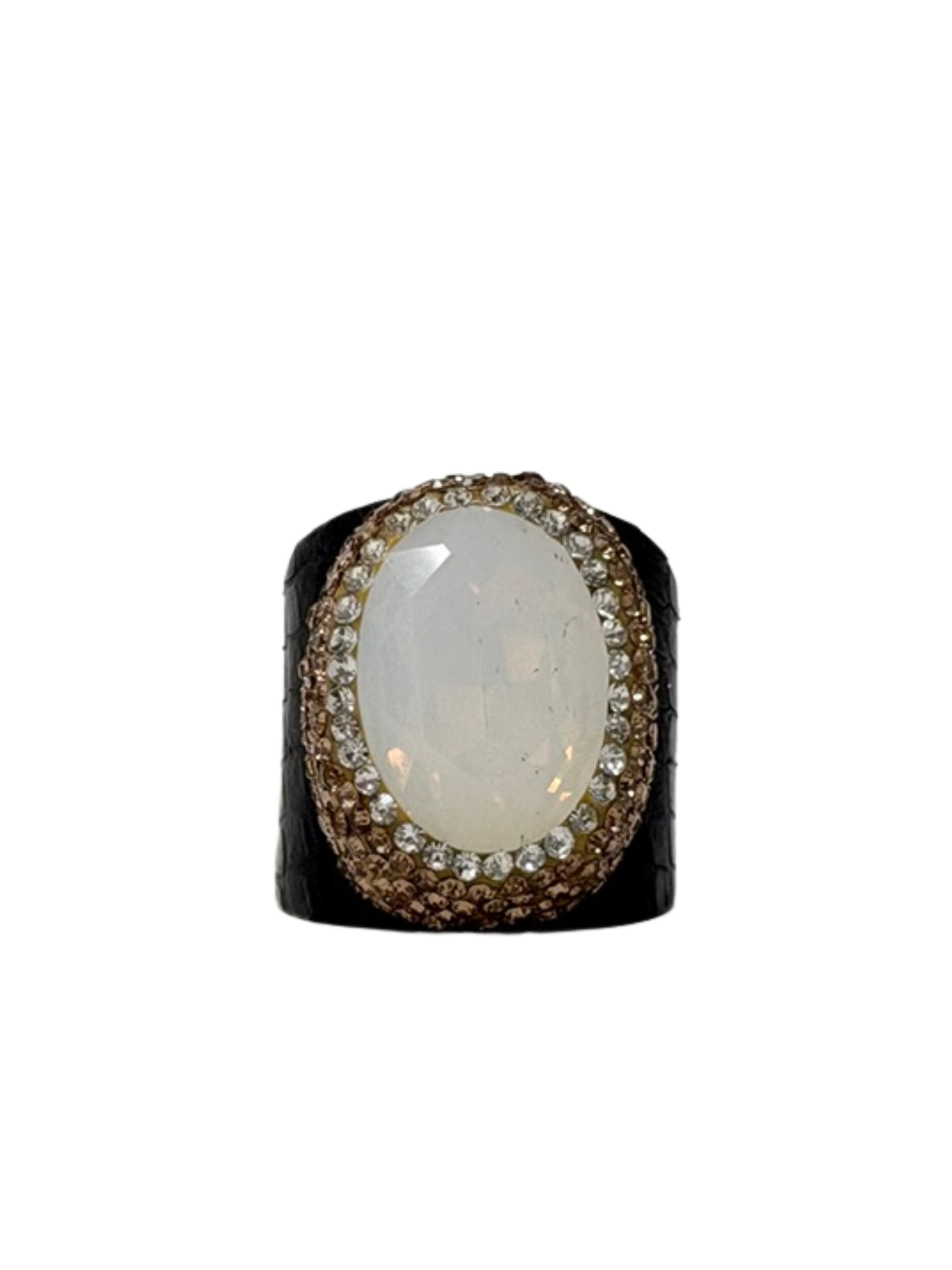 Queen of Sheba Fashion Ring featuring a large oval white stone surrounded by crystals on a black band