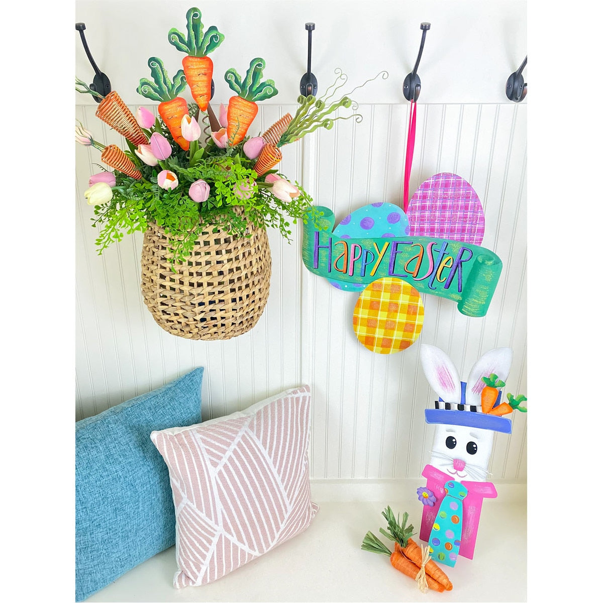 Happy Easter egg banner sign with a white background featuring colorful illustrated eggs in blue, pink, yellow, and green.