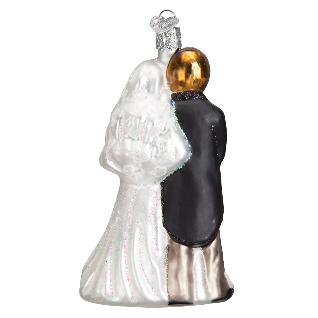 Glass bridal couple ornament featuring a bride in a white gown and a groom in a black tuxedo.