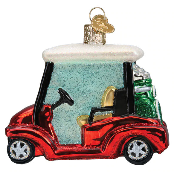 Glass golf cart ornament shaped like a miniature vehicle in red with white accents