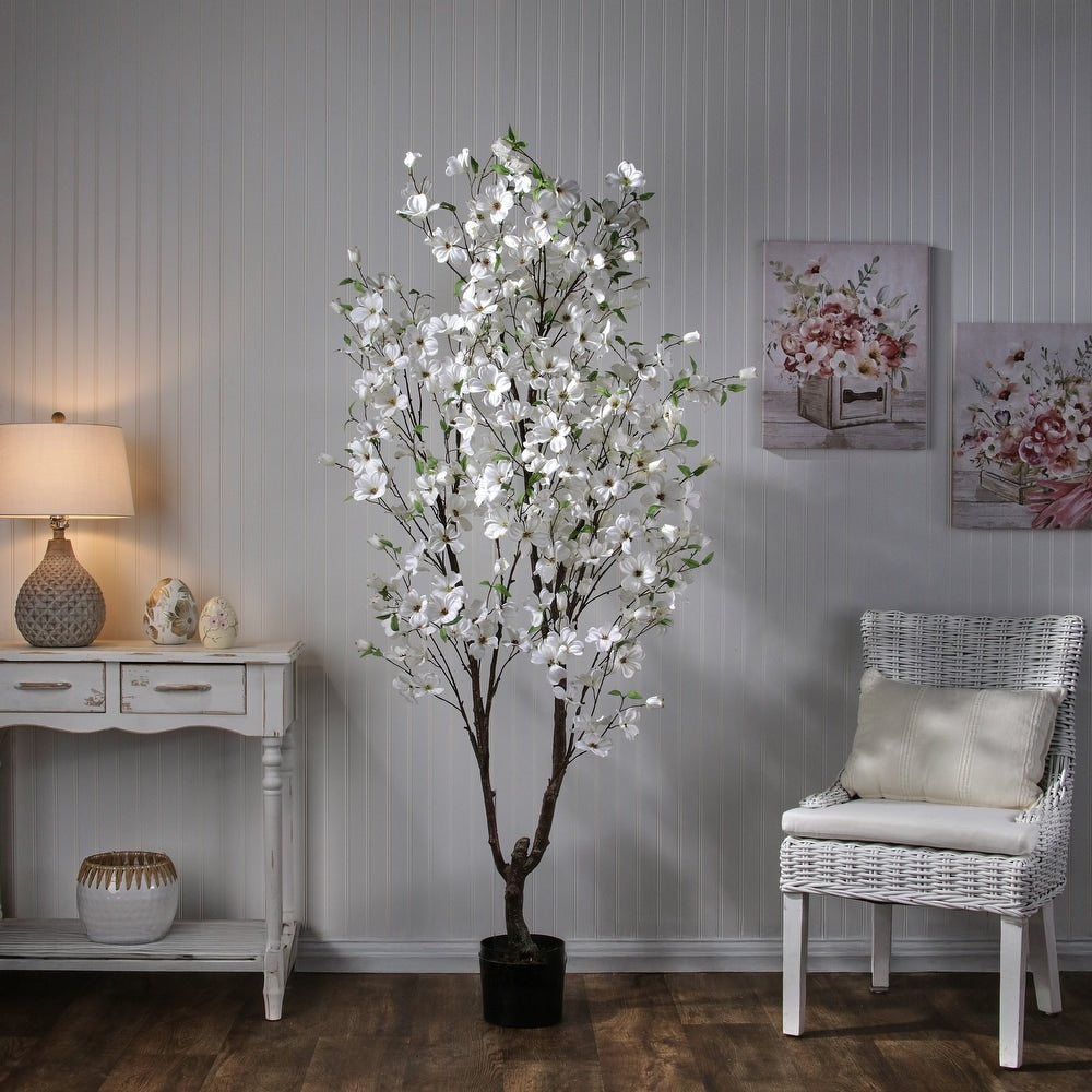Artificial Southern Dogwood tree with lifelike pink blossoms and green foliage in a starter pot.