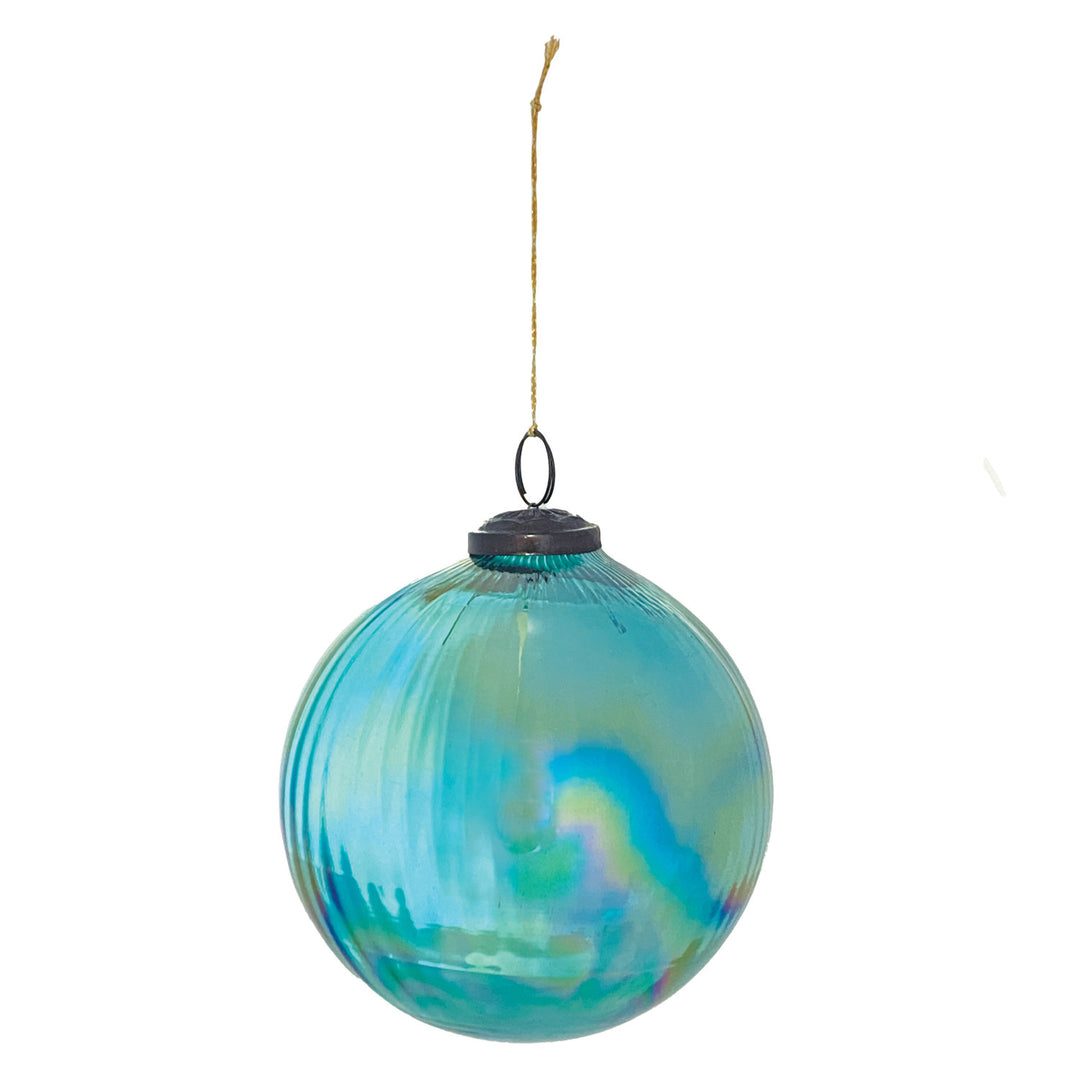 Iridescent blue glass ball ornament with vertical ribbing and a dark iron cap hanging from a string.
