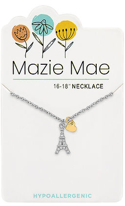 Silver Eiffel Tower necklace with a small gold heart charm on a Mazie Mae display card.