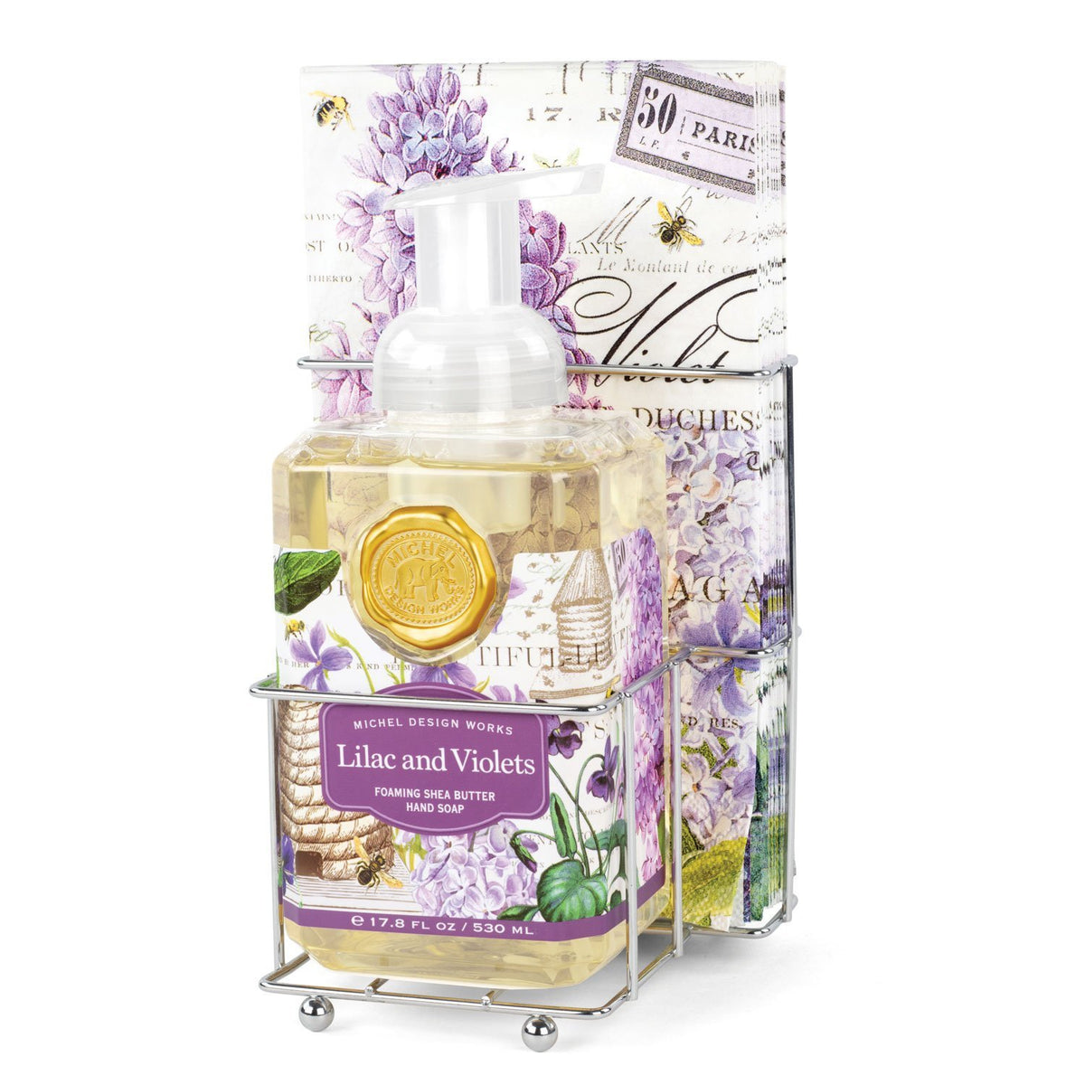 Foaming soap dispenser with matching napkin holder in a compact countertop set.