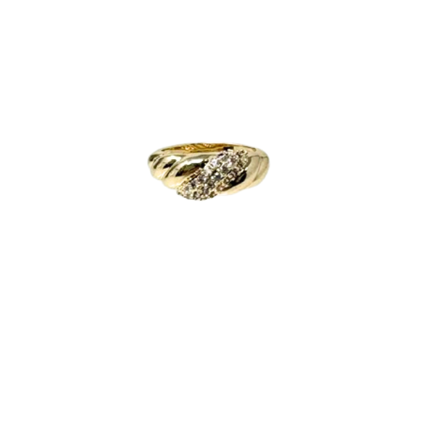Gold chunky statement ring with a ribbed texture and a diagonal band of sparkling clear stones.