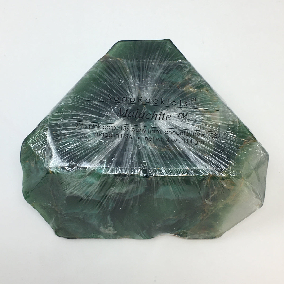 Handmade stone-shaped glycerine soap bar infused with natural botanicals like aloe and lavender.