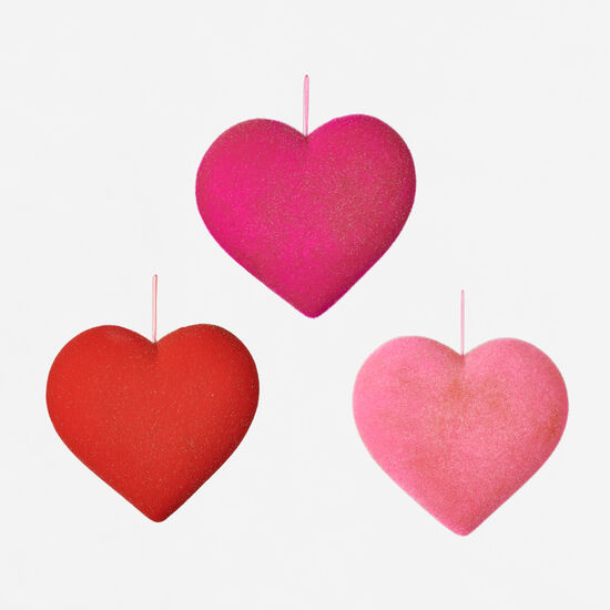A 12-inch white PVC heart with a flocked texture sold individually.