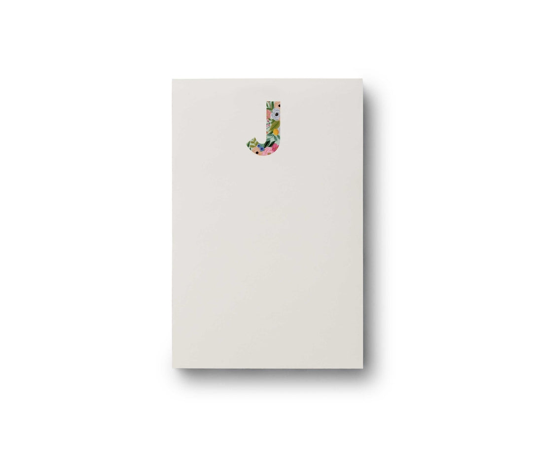 Garden Party monogram notepad with floral illustrated cover and tear-off sheets.