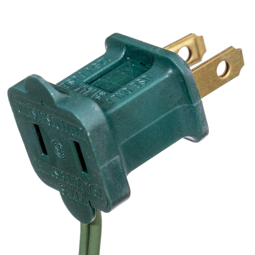 Close-up of a green stackable male and female power plug for a pre-lit Christmas garland.